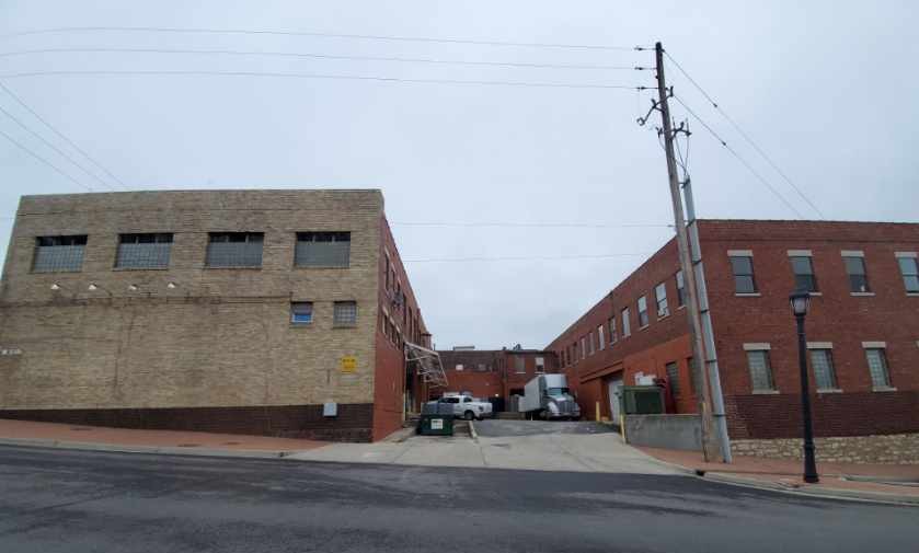 The Strawberry Hilltop Warehouse today - the tan-brick and red-brick buildings at 5th and Barnett