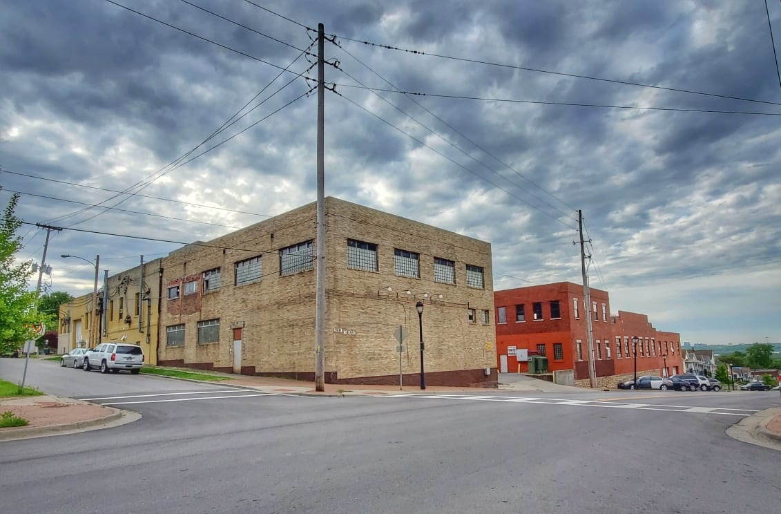 The Strawberry Hilltop Warehouse - a restored 1910 brick industrial building on the bluff at 5th & Barnett